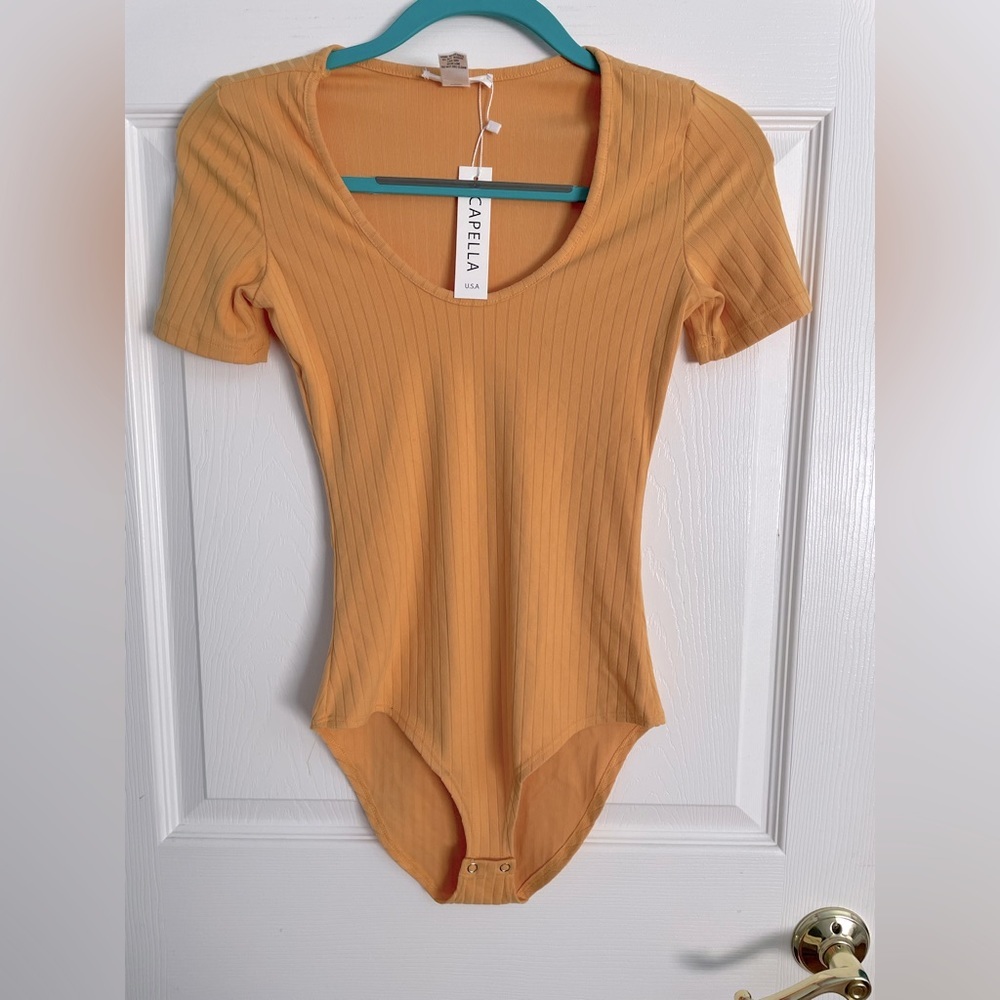 Capella mustard yellow short sleeve body suit NWT